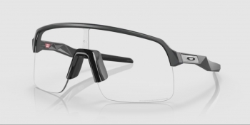 OAKLEY Sutro Lite carbonio opaco / Clear to Black Iridium fotocromatico